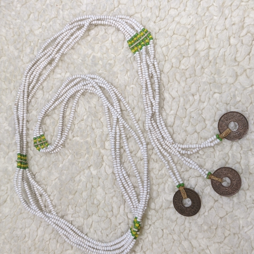 25" beaded boho necklace with dangling coins.
